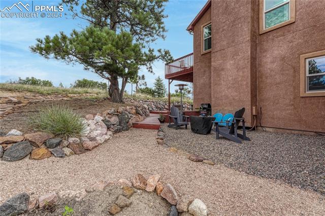 2690 Spaatz Road Monument, CO 80132 - Photo 38 of 50 View of yard featuring a patio
