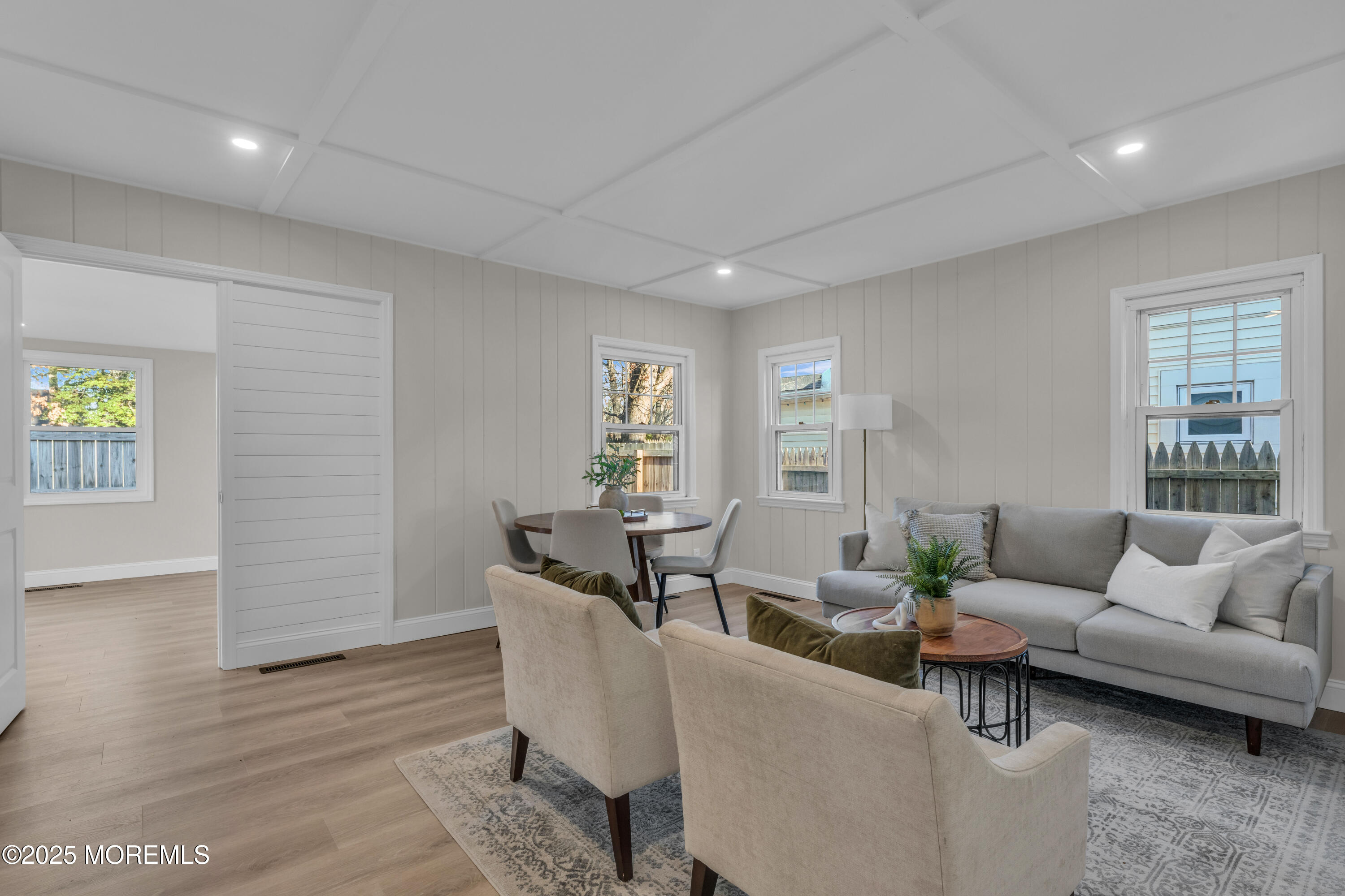 679 Mantoloking Road Brick, NJ 08723 - Photo 2 of 16 a living room with furniture and wooden floor