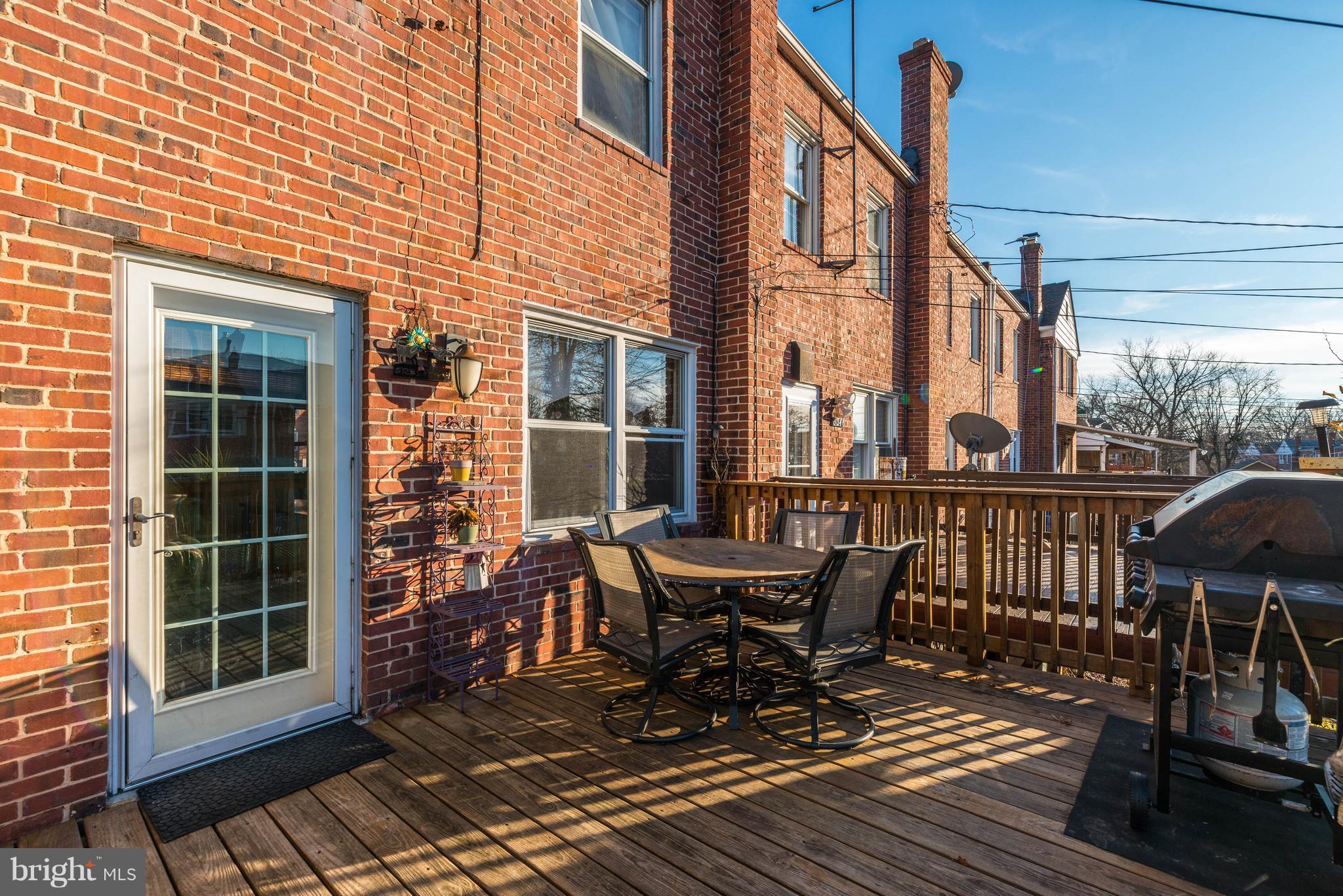 8348 Ridgely Oak Road Baltimore, MD 21234 - Photo 22 of 26 a view of a chairs on the deck