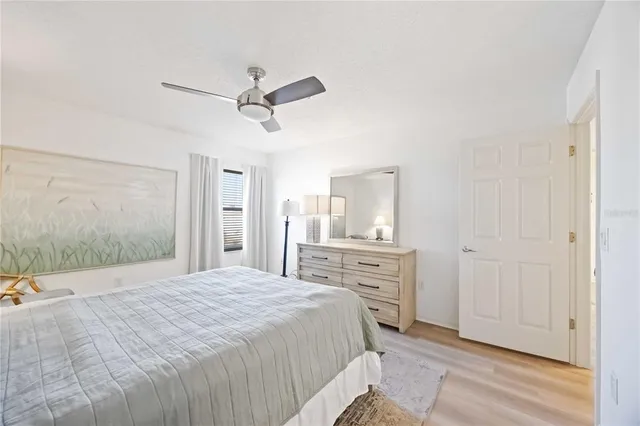 a bathroom with a sink double vanity mirror and shower