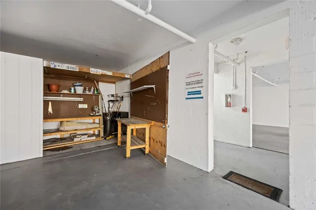 a view of a chairs and table in a balcony