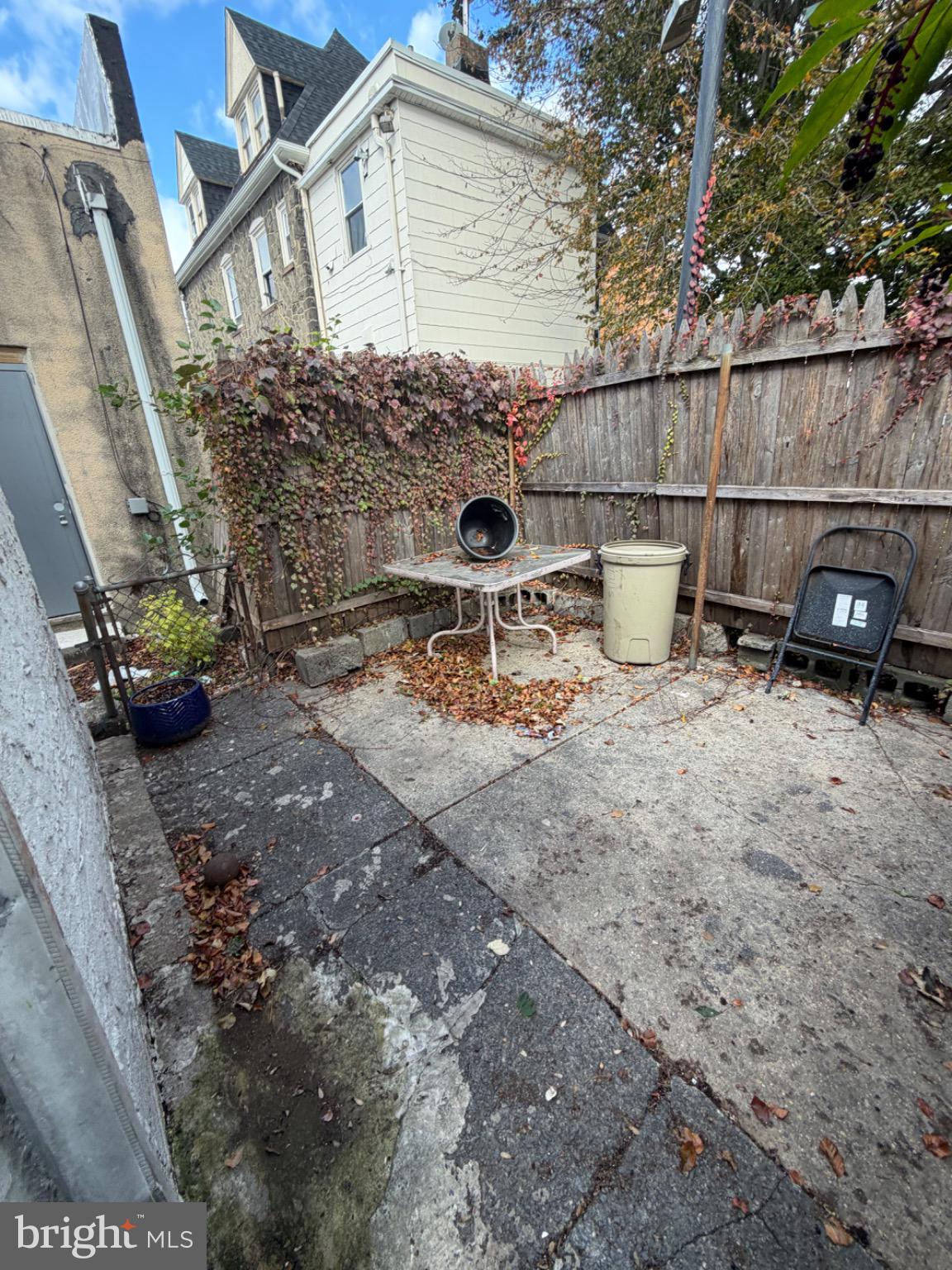 1609 Fillmore Street Philadelphia, PA 19124 - Photo 19 of 20 a view of a chair and table in backyard