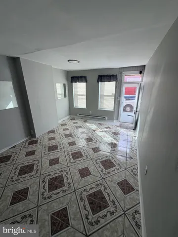 a view of a livingroom with wooden floor
