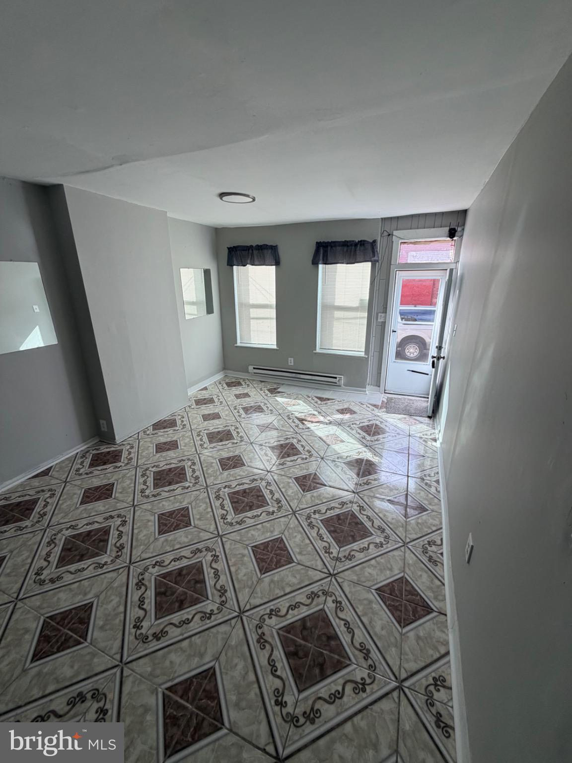 1609 Fillmore Street Philadelphia, PA 19124 - Photo 2 of 20 a view of a livingroom with wooden floor