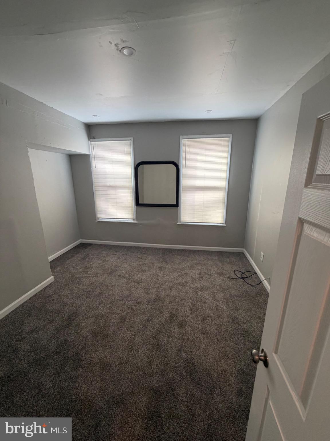 1609 Fillmore Street Philadelphia, PA 19124 - Photo 3 of 17 Bright and airy room with cozy carpet.