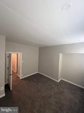 an empty room with closet