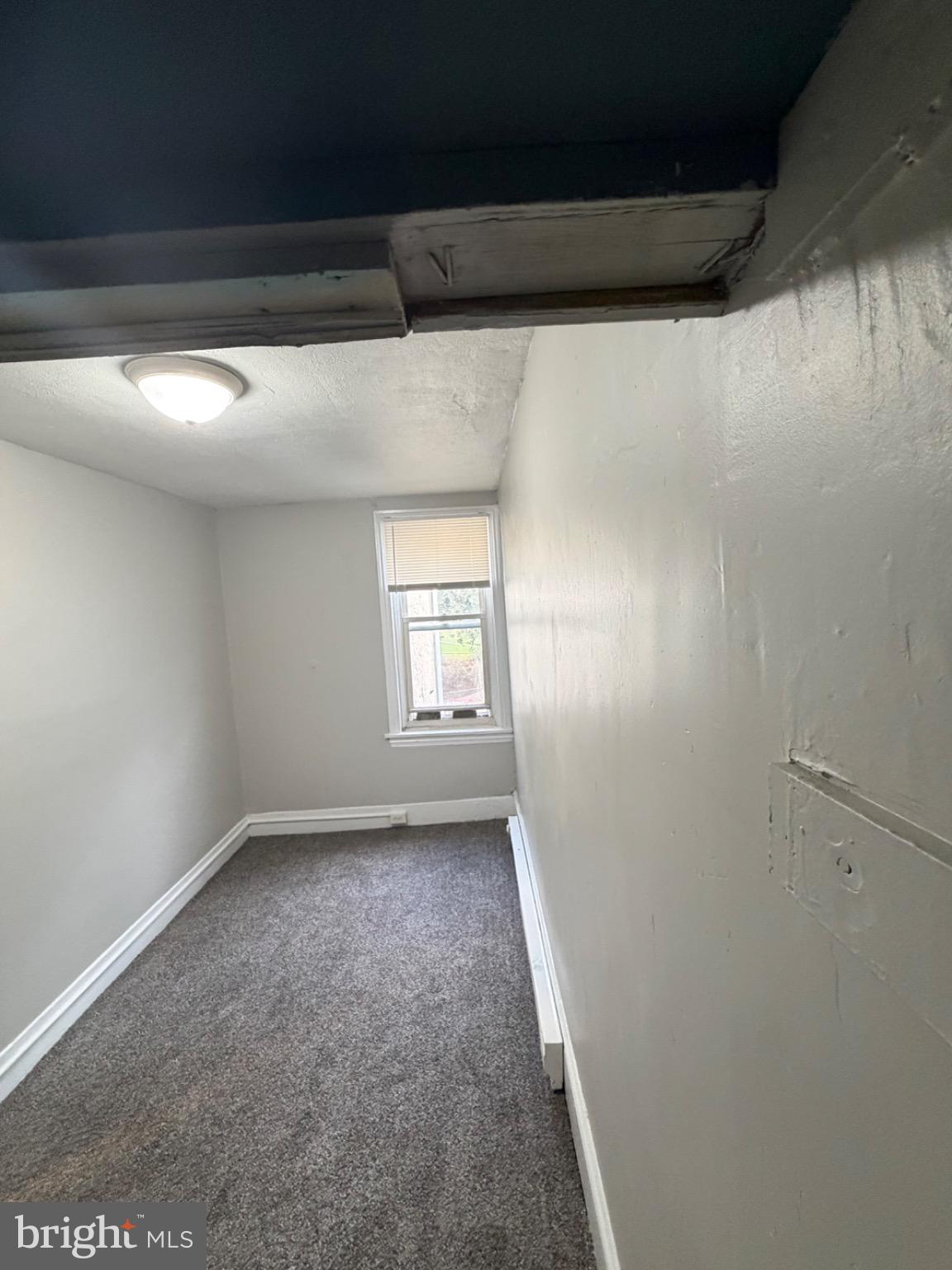 1609 Fillmore Street Philadelphia, PA 19124 - Photo 8 of 17 Cozy, light-filled room with fresh paint.