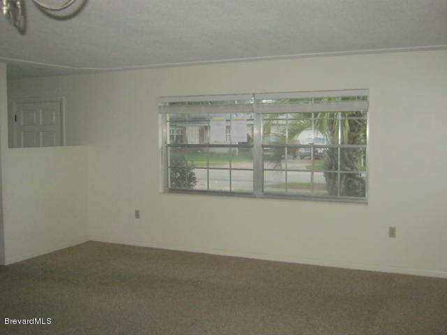 1485 Holiday Boulevard Merritt Island, FL 32952 - Photo 10 of 12 Master Bedroom