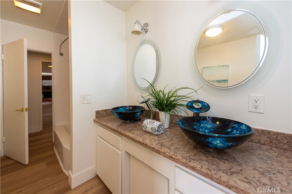 1112 Steele Drive Brea, CA 92821 - Photo 20 of 34 a bathroom with a granite countertop and a mirror