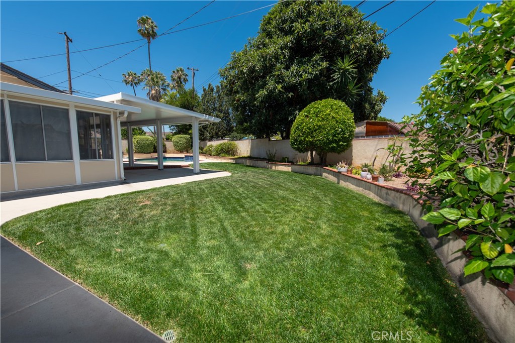 1112 Steele Drive Brea, CA 92821 - Photo 31 of 34 a view of a house with a backyard garden and sitting area