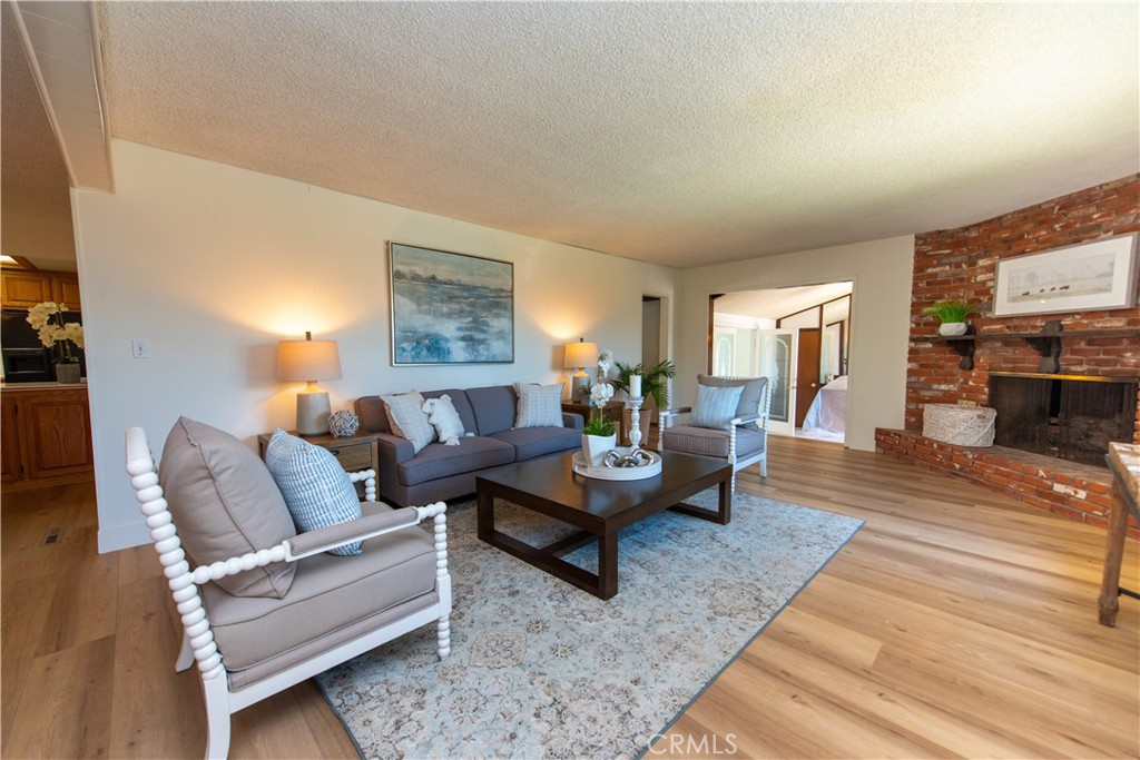 1112 Steele Drive Brea, CA 92821 - Photo 6 of 34 a living room with furniture and a fireplace