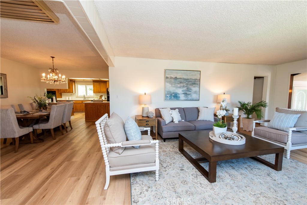 1112 Steele Drive Brea, CA 92821 - Photo 7 of 34 a living room with furniture and a wooden floor