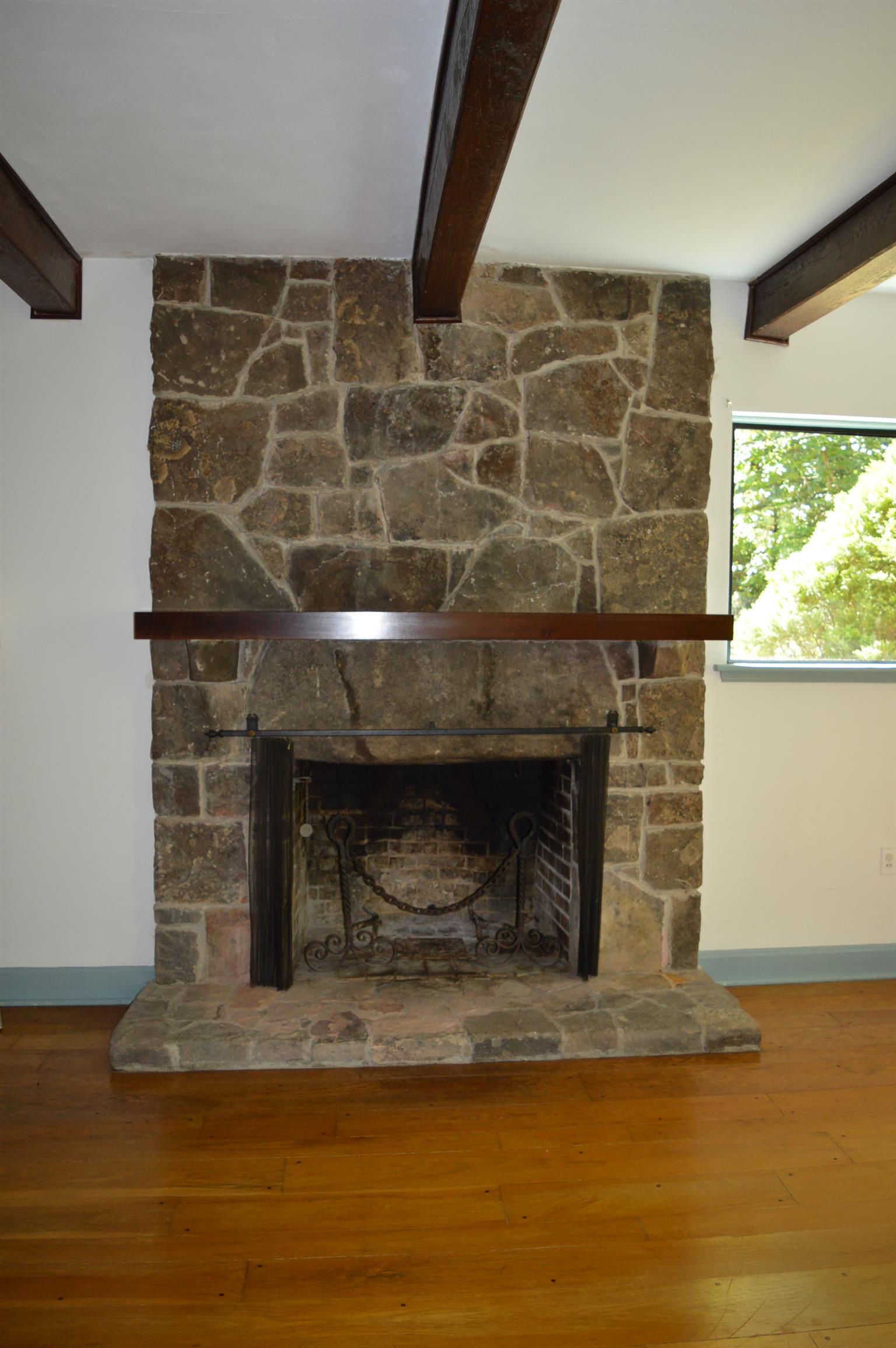 246 Curlicue Road Sewanee, TN 37375 - Photo 9 of 20 a room with a fireplace