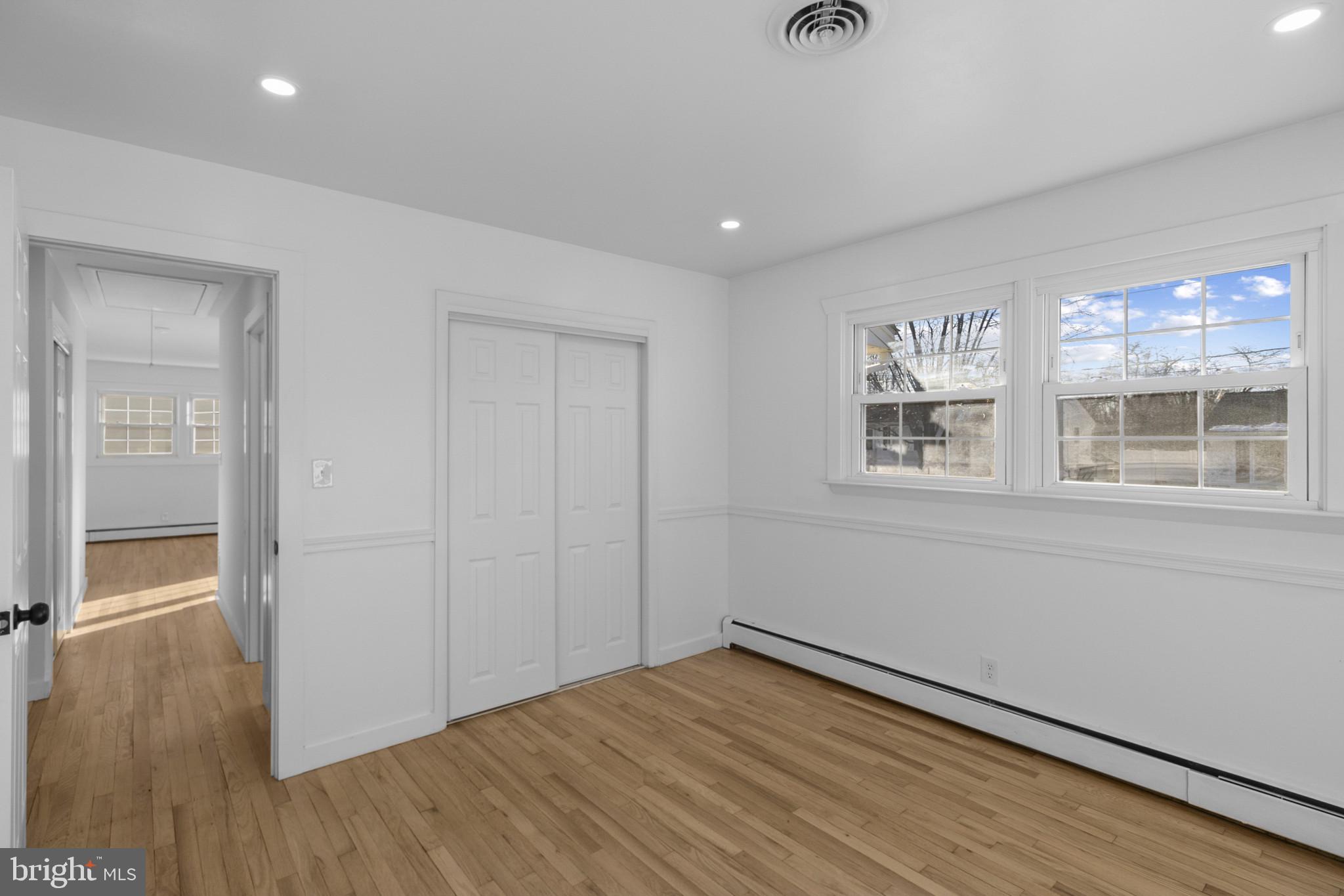809 South Scott Street Middletown, DE 19709 - Photo 13 of 25 wooden floor in an empty room with a window