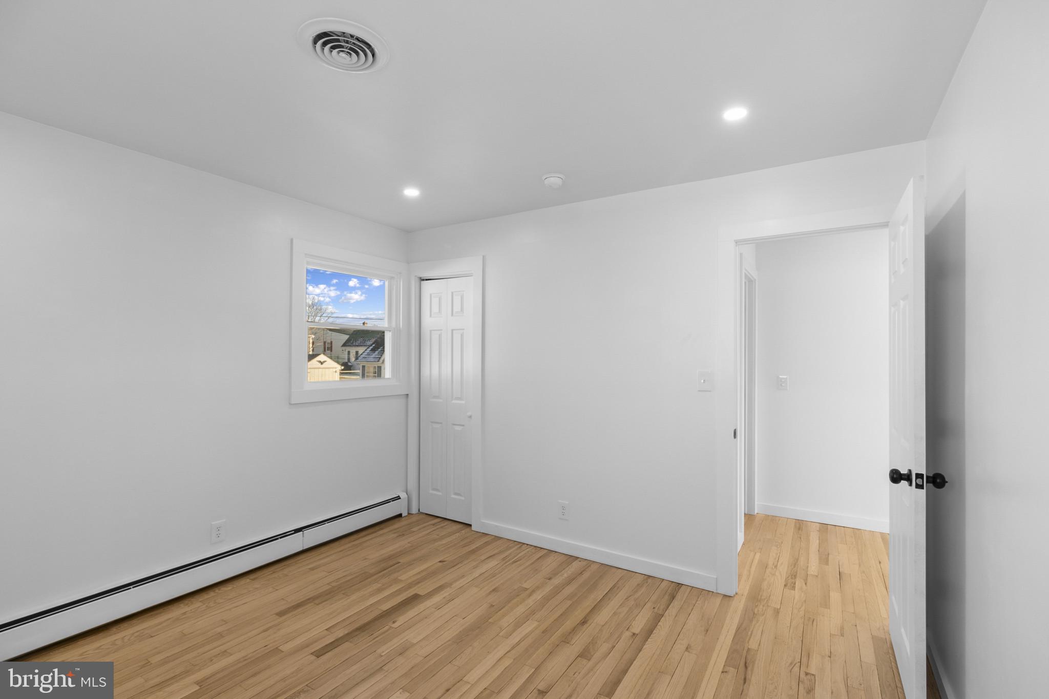 809 South Scott Street Middletown, DE 19709 - Photo 17 of 25 a view of a room with wooden floor and window