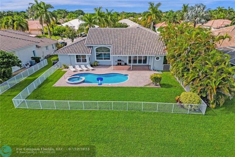 12355 Rockledge Circle Boca Raton, FL 33428 - Photo 3 of 38 a view of an house with backyard space and garden