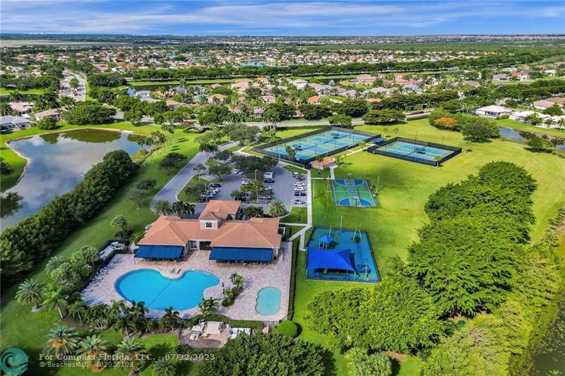 12355 Rockledge Circle Boca Raton, FL 33428 - Photo 36 of 38 an aerial view of residential houses with outdoor space and lake view
