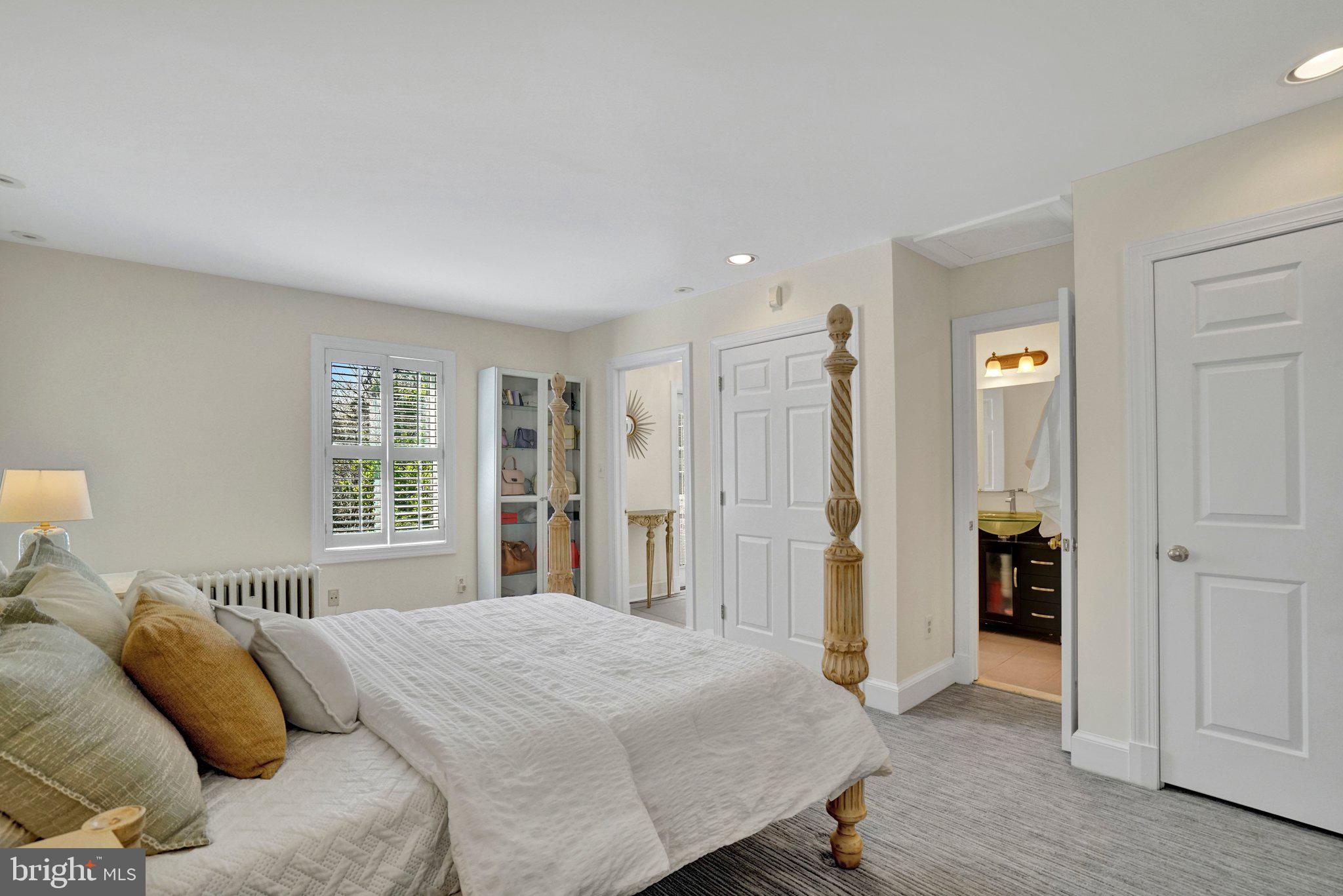 4916 26th Street North Arlington, VA 22207 - Photo 17 of 46 a bedroom with a bed and a window