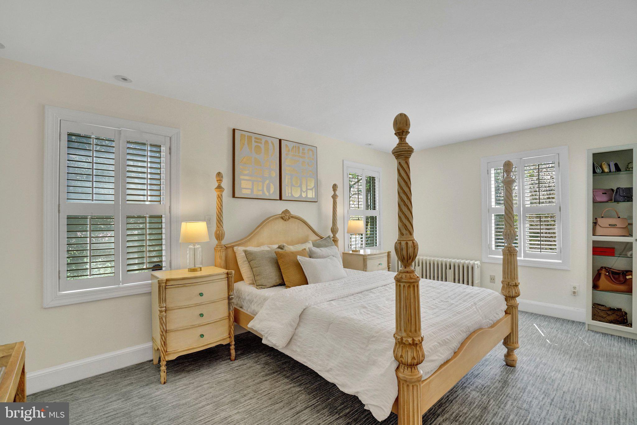 4916 26th Street North Arlington, VA 22207 - Photo 18 of 46 a bedroom with a bed and a window