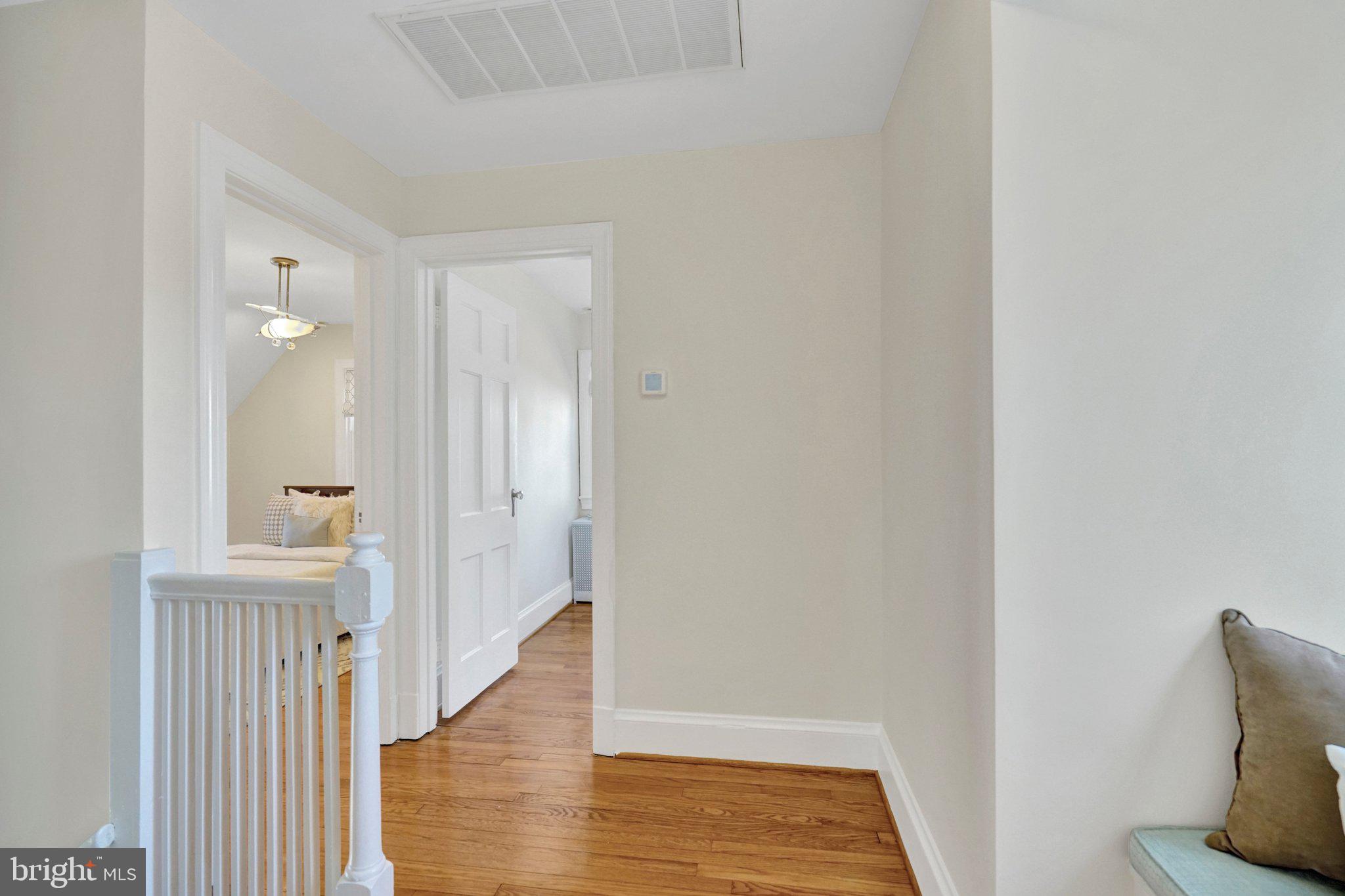 4916 26th Street North Arlington, VA 22207 - Photo 25 of 46 a view of a hallway with wooden floor