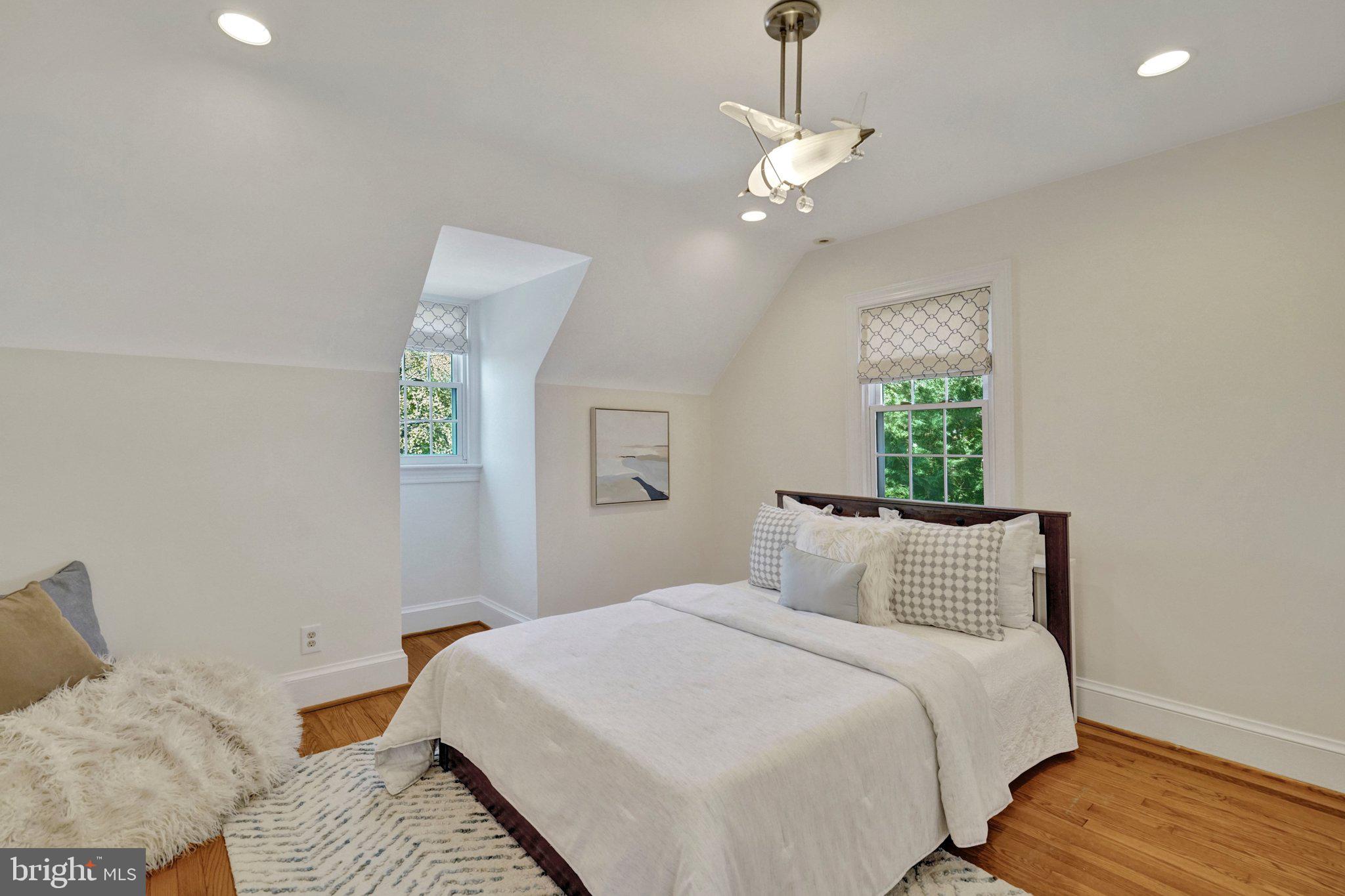 4916 26th Street North Arlington, VA 22207 - Photo 26 of 46 a bedroom with a bed and a window
