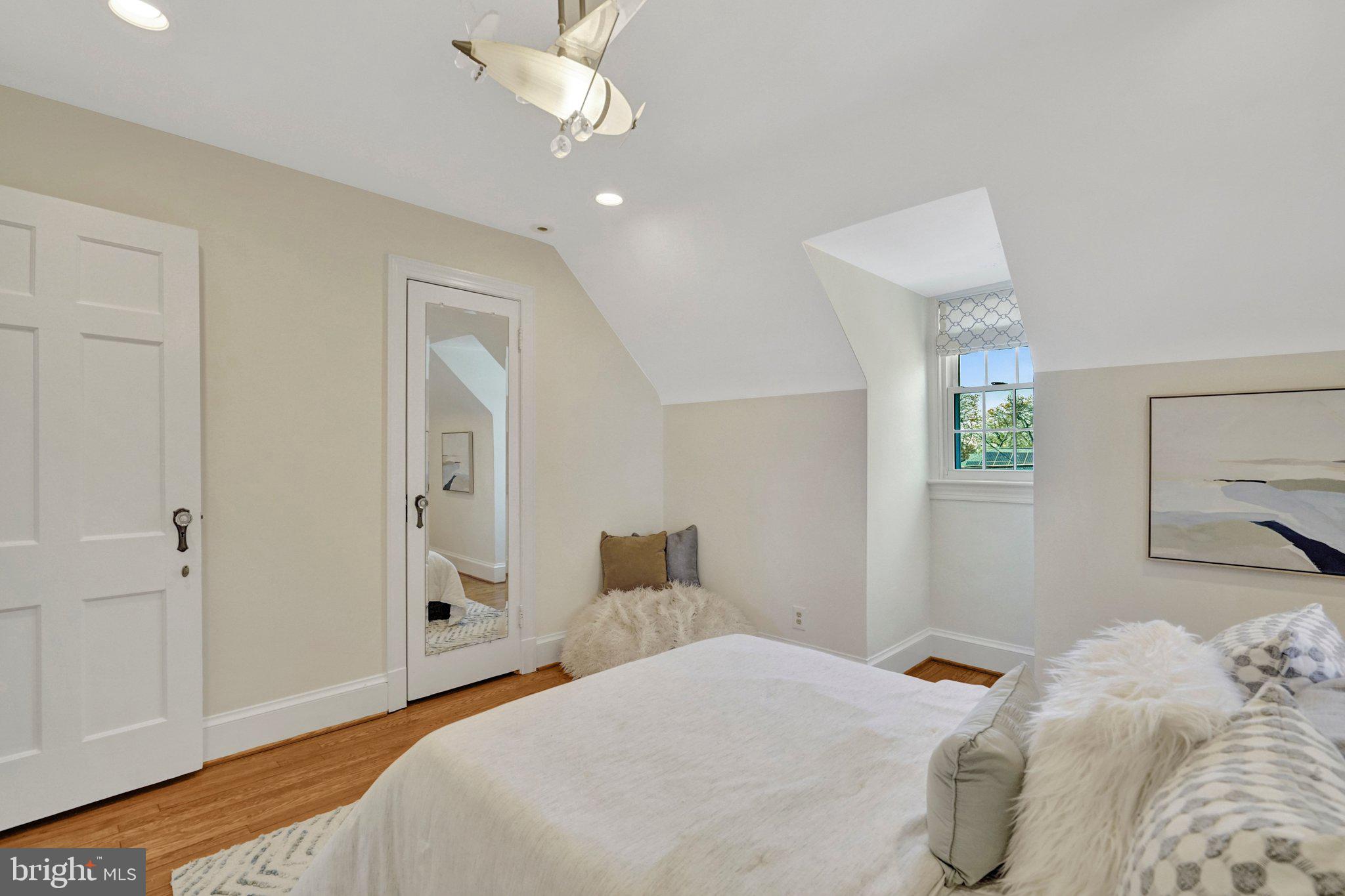 4916 26th Street North Arlington, VA 22207 - Photo 27 of 46 a bedroom with a bed and a window