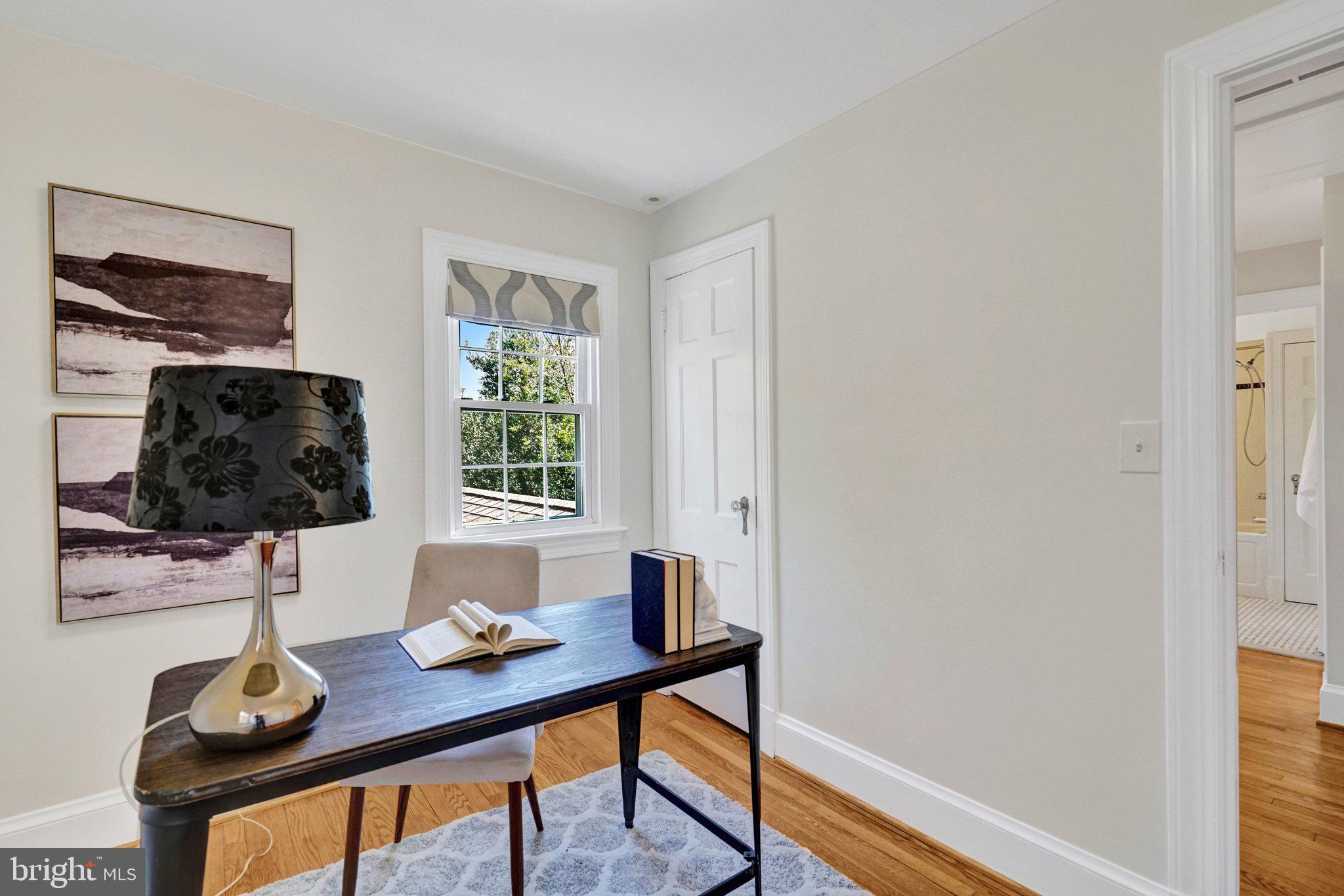 4916 26th Street North Arlington, VA 22207 - Photo 29 of 46 a workspace with furniture and window