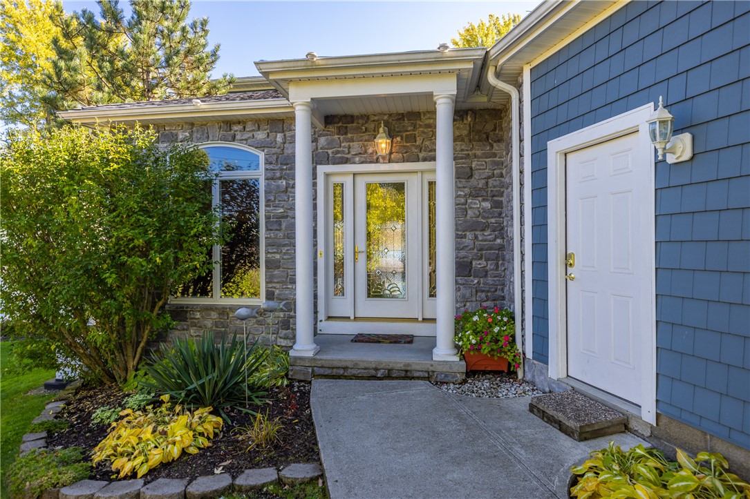 8833 Sandy Bottom Road Richmond, NY 14471 - Photo 12 of 50 IMPRESSIVE COVERED ENTRY WITH LEADED GLASS DOOR &