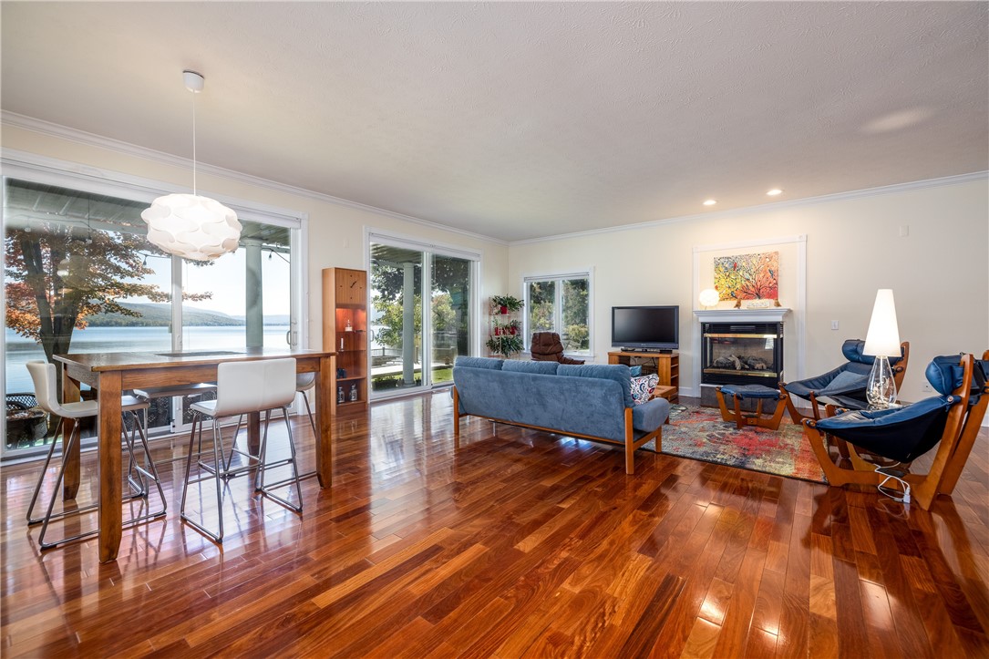 8833 Sandy Bottom Road Richmond, NY 14471 - Photo 19 of 50 SPECTACULAR GREAT ROOM WITH GAS FIREPLACE & WALL O