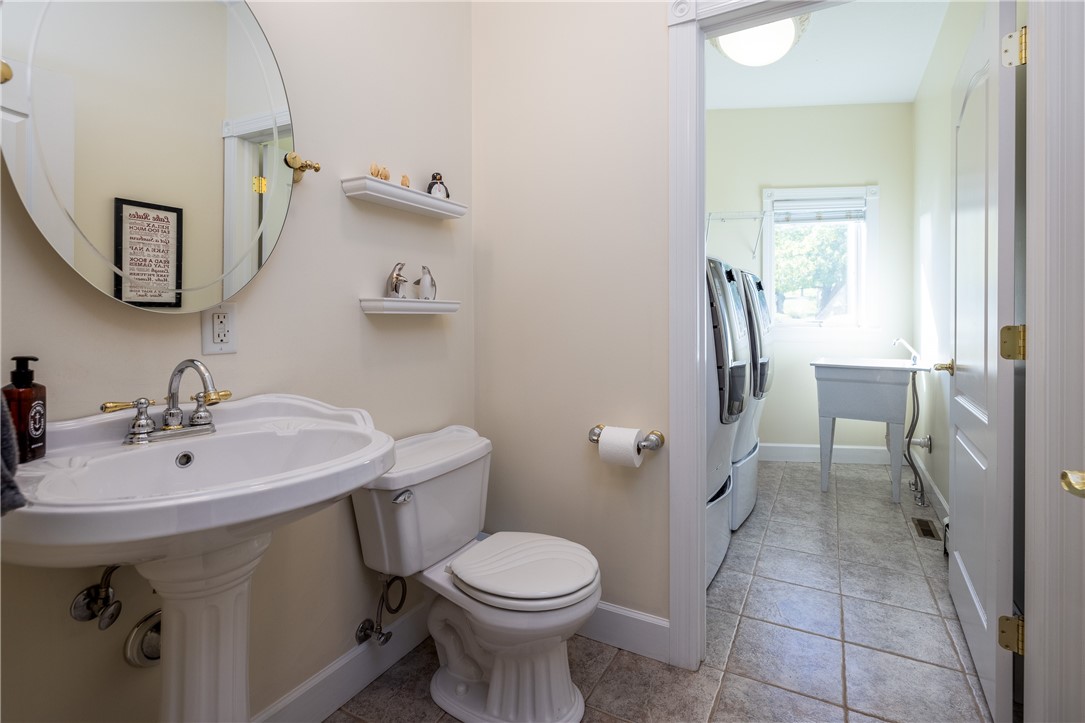 8833 Sandy Bottom Road Richmond, NY 14471 - Photo 28 of 50 1ST FLOOR POWDER ROOM WITH LAUNDRY
