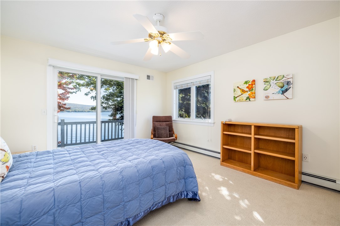 8833 Sandy Bottom Road Richmond, NY 14471 - Photo 31 of 50 SPACIOUS LAKEVIEW UPSTAIRS BEDROOM OPENING TO DECK