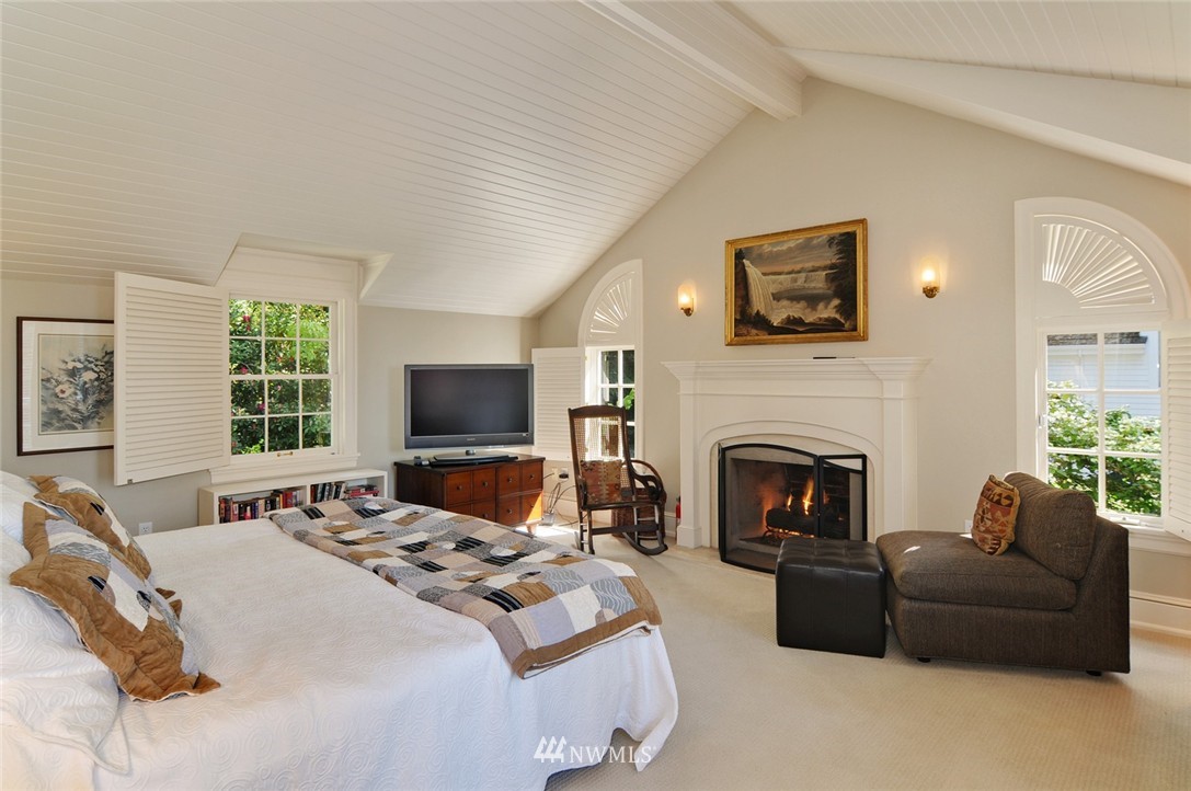 21 Cherry Loop Northwest Shoreline, WA 98177 - Photo 15 of 25 a bedroom with a bed and a fireplace