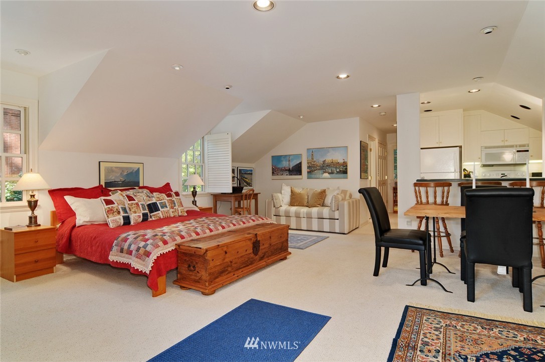 21 Cherry Loop Northwest Shoreline, WA 98177 - Photo 19 of 25 a bedroom with furniture and a book shelf
