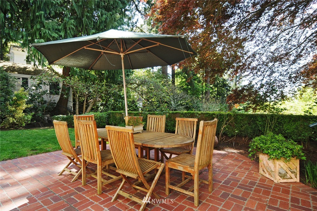 21 Cherry Loop Northwest Shoreline, WA 98177 - Photo 21 of 25 a patio table and chairs under an umbrella