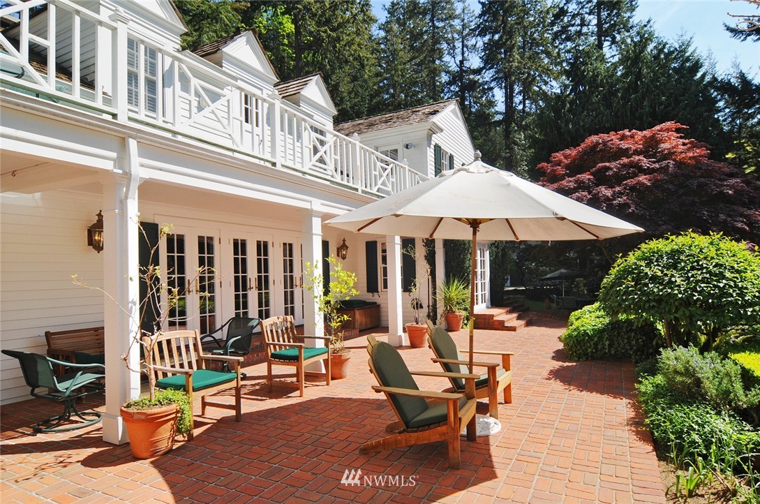21 Cherry Loop Northwest Shoreline, WA 98177 - Photo 22 of 25 an outdoor space with patio and white umbrellas