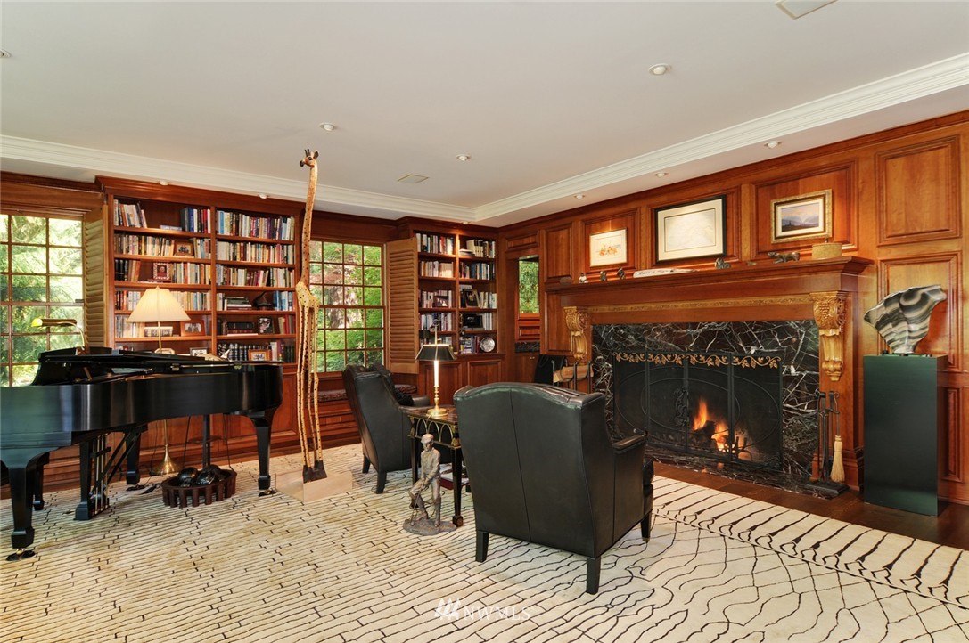 21 Cherry Loop Northwest Shoreline, WA 98177 - Photo 6 of 25 a living room with furniture a fireplace and a large window