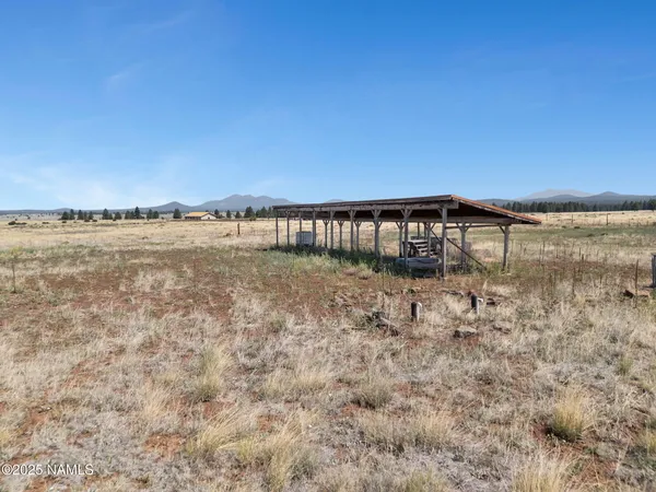 a view of a lake with a lake in the background