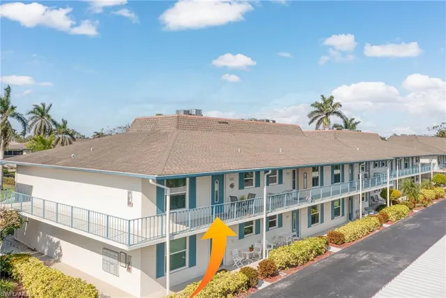 a front view of a house with a ocean view