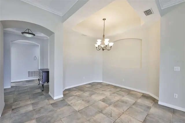 a view of an empty room with a bathroom