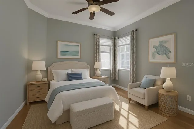a bedroom with a bed and ceiling fan