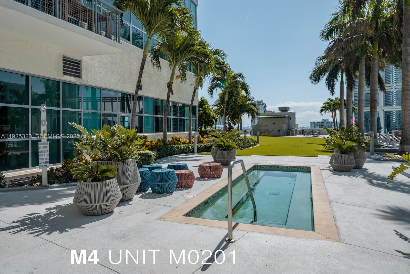 3301 Northeast 1st Avenue, Unit M0201 Miami, FL 33137 - Photo 15 of 20 a view of a swimming pool with a patio
