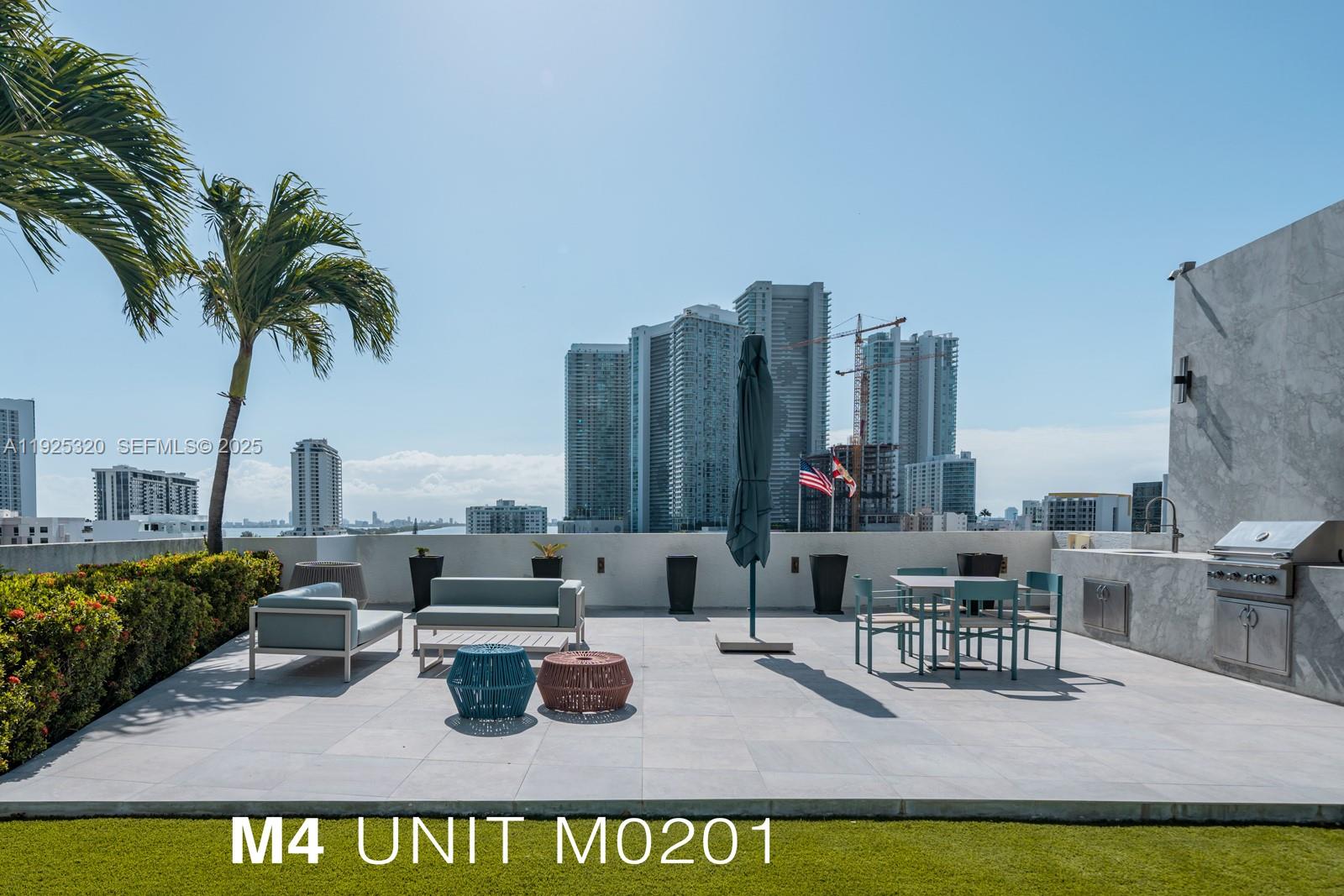 3301 Northeast 1st Avenue, Unit M0201 Miami, FL 33137 - Photo 18 of 20 a view of outdoor space with seating area