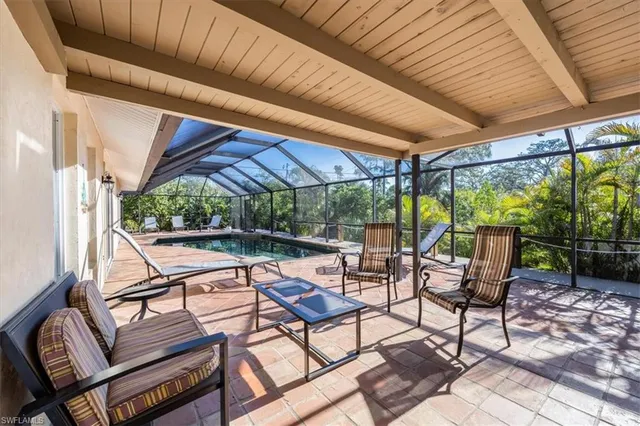 a view of swimming pool with a patio