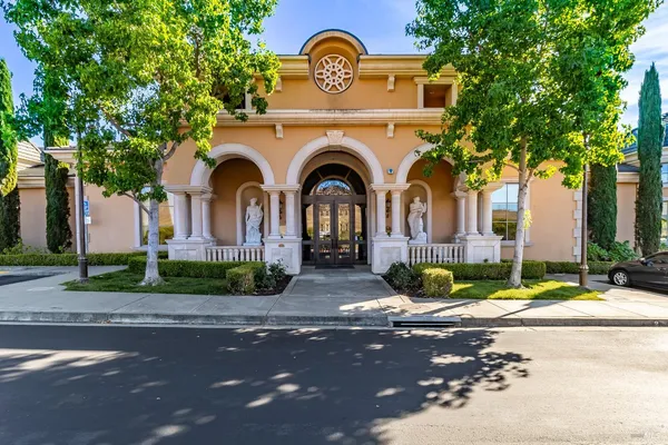a view of a livingroom with furniture and a view of bedroom