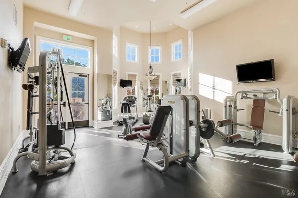 a view of a livingroom with wooden floor and a couch