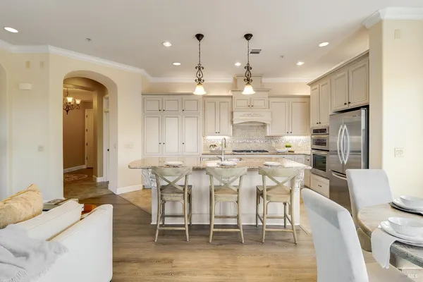 a living room with furniture a fireplace and a fireplace