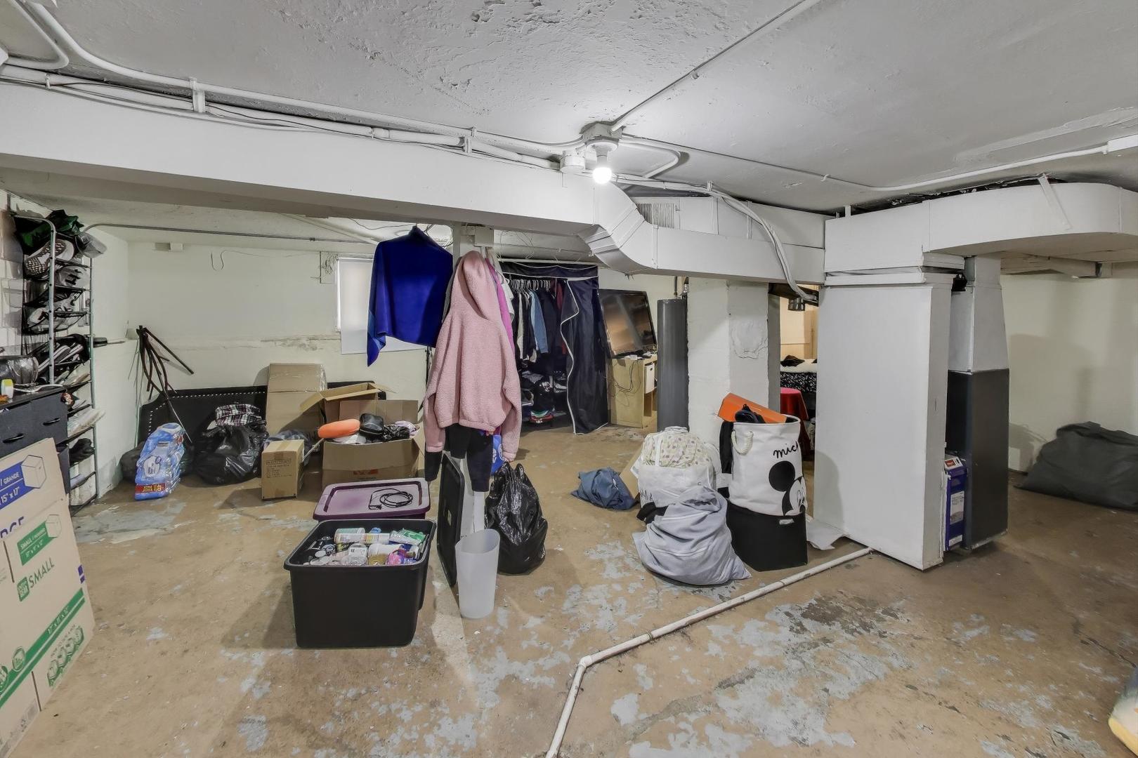 3449 North Kostner Avenue Chicago, IL 60641 - Photo 15 of 28 a storage and utility room