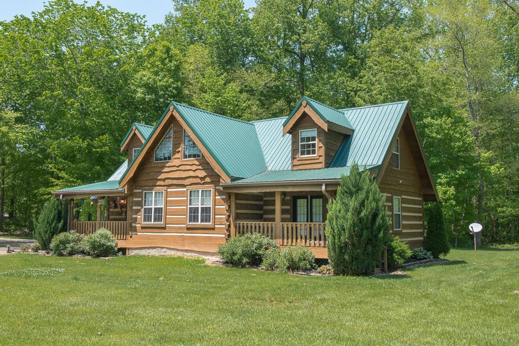 4038 Wells Road Springfield, TN 37172 - Photo 3 of 30 a front view of a house with a garden