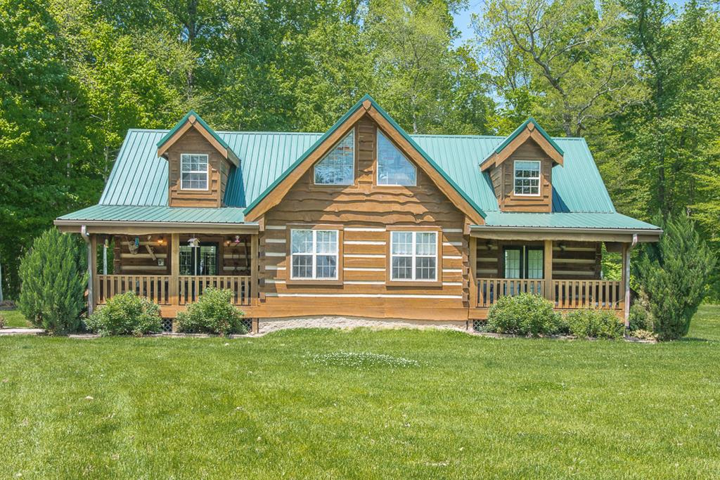 4038 Wells Road Springfield, TN 37172 - Photo 4 of 30 a front view of a house with a yard and trees
