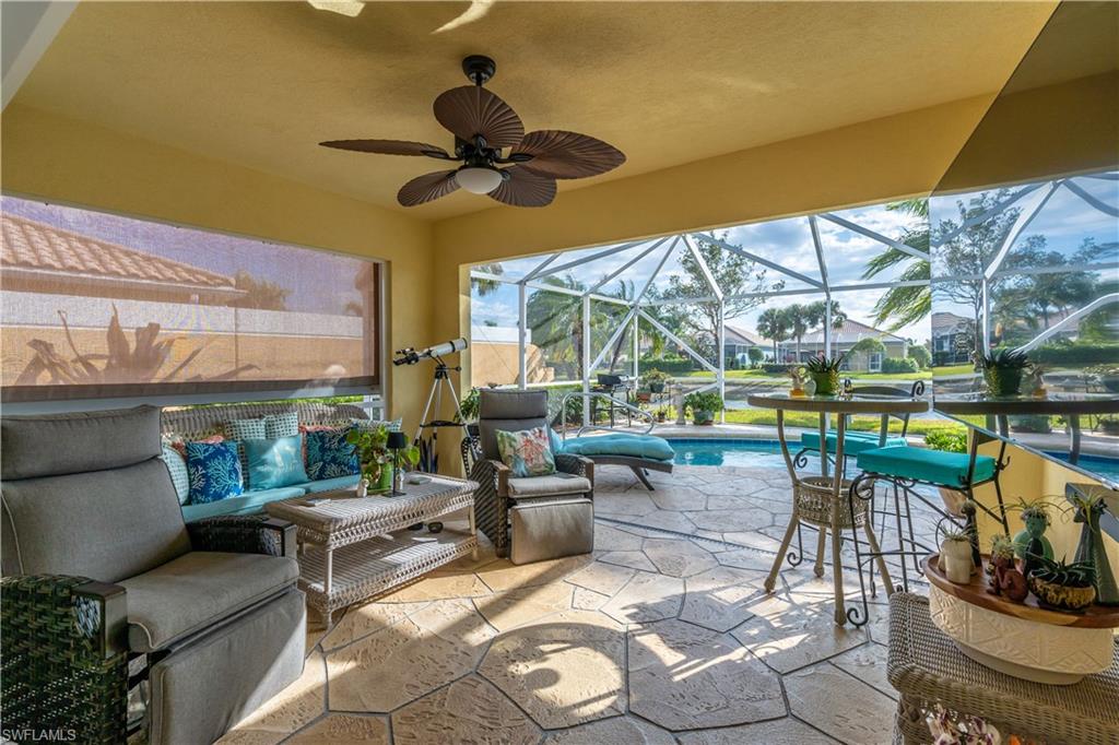 7568 Novara Court Naples, FL 34114 - Photo 26 of 34 a outdoor space with patio the couches and a potted plant